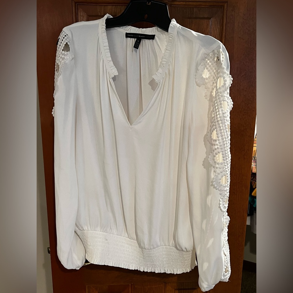 White House with cutout sleeves